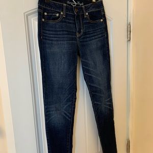 American Eagle super skinny dark blue jean size 2